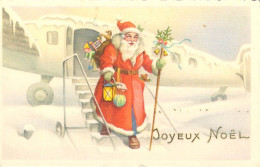 Carte Mignonette Du Père Noël Santa Claus Descendant D'un Avion Avec Ses Jouets Sous La Neige - Other & Unclassified