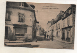 23. CPA - AUZANCES - La Grande Rue - Commerces - Série La Creuse Pittoresque - 1933 - - Auzances