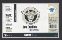 Etiquette De Bière Saanen Blanche  -  Brasserie  Les Ouailles Du Luberon  à  Cheval Blanc   (84) - Birra
