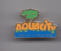 Pin's Aquacity Aquatic Jungle Parc Arbre   Réf 6050 - Autres & Non Classés
