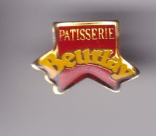 Pin's Patisserie Beurlay En Charente Maritime Dpt 17 Réf 8510 - Steden