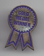 Pin's Gold Medal Winner Réf 4898 - Autres & Non Classés