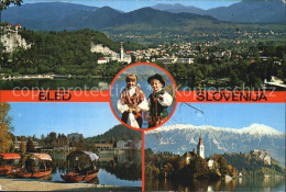 72532673 Bled Panorama Touristenboote Kinder In Landestracht Kirche  - Slovenië