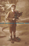 R059715 Boy Holding Flowers In His Hand. Old Photography - World