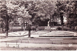 81 - Tarn -  LACAUNE  Les BAINS -  Le Jardin Public Et Le Monument Aux Morts - Sonstige & Ohne Zuordnung