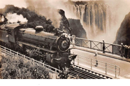 Zimbabwe - N°67756 - A Rhodesia Railway's Train Crossing The Victoria Falls Bridge - Train - Zimbabwe