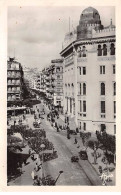 ALGERIE - ALGER - SAN31369 - La Grande Poste Et La Rue D'Isly - CPSM 14x9 Cm - Autres & Non Classés