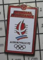 811H Pin's Pins / Beau Et Rare / JEUX OLYMPIQUES / ALBERTVILLE 1992 MONDIAL ASSISTANCE - Juegos Olímpicos