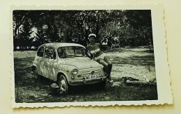 A Woman In A Bikini Poses Sitting On A Small Fiat Car - Automobile