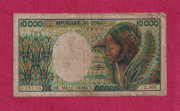 Congo,1992- 10000 Francs. Obverse Woman And Antelopes Heads. Reverse People Loading Bananas Onto Truck.  BB- VF- TTB. - Republic Of Congo (Congo-Brazzaville)