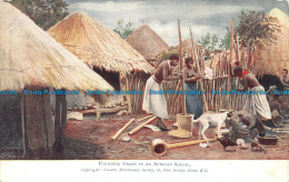 R102959 Pounding Grain In An African Kraal. London Missionary Society. Bill Hopk - Other & Unclassified
