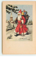 Noël - Père Noël Marchant Dans La Neige, En Portant Sac Rempli De Cadeaux - Autres & Non Classés