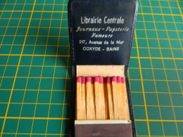 COXYDE BAINS: POCHETTE D'ALUMETTES AVEC PROTECTION PLASTIQUE DE LA LIBRAIRIE CENTRALE 217 AVENUE DE LA MER  PUB MARTINI - Matchboxes