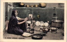A Hindu Woman Cooking - Inde