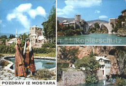 72213778 Mostar Moctap Br?cke Teilansichten Landestrachten  Mostar - Bosnien-Herzegowina