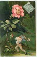 N°18445 - Carte Gaufrée - Souvenir - Nain Coupant Une Rose Ayant Un Portrait De Bébé Au Coeur - Surréalisme - Otros & Sin Clasificación