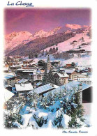 74 - La Clusaz - Le Village Et Son Clocher à Bulbe - Hiver - Neige - CPM - Voir Scans Recto-Verso - La Clusaz