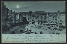 Mondschein-AK Linz, Franz Josef-Platz Mit Geschäften Und Denkmal  - Altri & Non Classificati