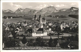 72161875 Lindenberg Allgaeu Ortsansicht Mit Kirche Queralpenstrasse Alpenpanoram - Lindenberg I. Allg.