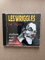 Les Wriggles: Justice Avec Des Saucisses/ CD - Autres & Non Classés