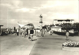 72152612 Rostock-Warnemuende Teepott Mit Leuchtturm Und Promenade Rostock - Rostock