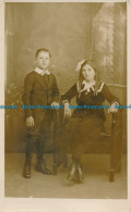 R122296 Old Postcard. A Boy And Girl - World