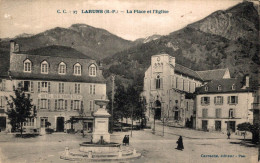 64 LARUNS LA PLACE ET L'EGLISE HOTEL DES TOURISTES - Laruns