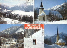 72454363 Neuhaus Schliersee Winterpanorama Alpen Kirche Skifahrer Neuhaus - Schliersee