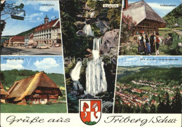 72452093 Triberg Schwarzwald Volkstrachten Marktplatz Schwarzwaldhaus  Triberg - Triberg