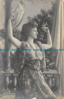 R127324 Old Postcard. Woman With Hand Fan - World