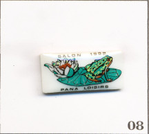 Pin’s Salon “Pana Loisirs“ 1992 Avec Grenouille Et Fleur De Nénuphar. Est. Thosca. Porcelaine. T1013-08 - Other & Unclassified