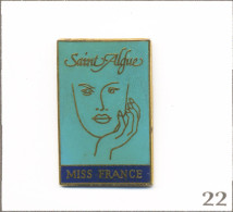 Pin’s Mode Et Beauté - Coiffure / “St Algue“ - Sponsor Officiel Élection “Miss France“. Non Est. EGF. T1016-22 - Marques