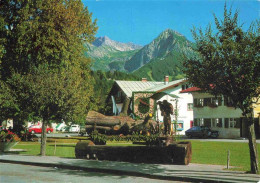 73978397 Fischen_Allgaeu Holzbrunnen Blick Gegen Nebelhorn Und Rubihorn Allgaeue - Fischen