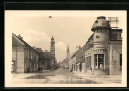 AK Stockerau /N.-D., Hauptstrasse Mit Cafe Zum Goldenen Stern  - Andere & Zonder Classificatie