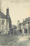 58 - Cosne Cours Sur Loire - Rue Saint Agnan - Animée - CPA - Etat Moyen - Voir Scans Recto-Verso - Cosne Cours Sur Loire