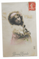 CPA Circulée En 1912 - Bonne Année - A.N 1251 - Fillette Avec Turban Et Manteau Rose Avec Manchon Et étole En Fourrure - - Año Nuevo