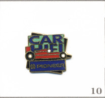 Pin's Transport - Automobile / Équipementier “Pioneer“ Audio Car Avec F1. Est. Euridis. EGF. T1024-10 - Otros & Sin Clasificación