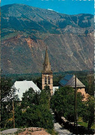 38 - Bourg D'Oisans - L'Eglise Et La Route D'Auris - Carte Neuve - CPM - Voir Scans Recto-Verso - Bourg-d'Oisans