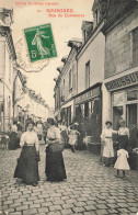 CPA Bourgueil-Rue Du Commerce-21-Timbre   L2938 - Autres & Non Classés