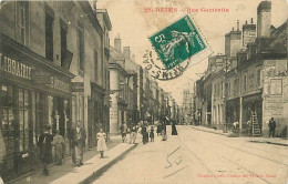 51 - Reims - Rue Gambetta - Animée - Oblitération Ronde De 1910 - CPA - Voir Scans Recto-Verso - Reims