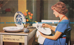 R631526 Girl Painting A Plate Royal Delftware Factory. De Porceleyne Fles. Fa. W - Monde