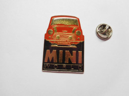 Superbe Pin's , Auto Austin Mini World , Verso Quadrillé - Altri & Non Classificati