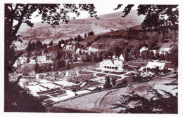 63 - Puy De Dome -  LA BOURBOULE   -  Parc D'enfants - Vue A Travers Les Arbres - La Bourboule