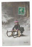 CPA Circulée En 1914 - Bonne Année - Lutetia 156 - Enfant Sur Une Luge Vêtu De Vert Et De Rose - - Neujahr