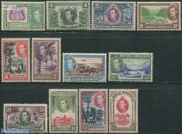 Belize/British Honduras 1938 Definitives 12v, Unused (hinged), History - Nature - Transport - Coat Of Arms - Trees & F.. - Rotary, Club Leones