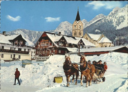 72099103 Ramsau Dachstein Steiermark Dorfpartie Kirche Pferdeschlitten Ramsau Am - Sonstige & Ohne Zuordnung