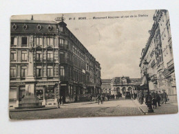 Carte Postale Ancienne (1913) Mons Monument Houzeau Et Rue De La Station - Mons