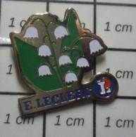 721 Pin's Pins / Beau Et Rare / MARQUES / MAGASINS LECLERC BRIN DE MUGUET 1er MAI PORTE-BONHEUR - Marche