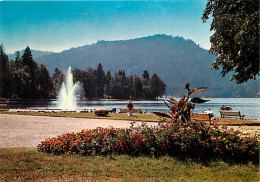 88 - Gérardmer - Le Lac Et La Tête De Mérelle - Fleurs - CPM - Voir Scans Recto-Verso - Gerardmer