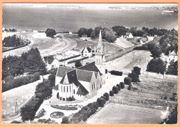 Ppgf/ CPSM Grand Format - COTES D'ARMOR - EN AVION AU DESSUS DE ST JACUT DE LA MER - VUE AÉRIENNE DE L'ÉGLISE & LANCIEUX - Saint-Jacut-de-la-Mer